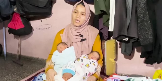 Gazze'de srail saldrlarndan kaarak bir okula snan kadn drdz annesi oldu
