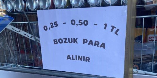 Bozuk para skntsn yaz asarak zmeye altlar