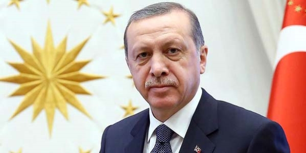 Cumhurbakan Erdoan'dan ehit ailelerine taziye