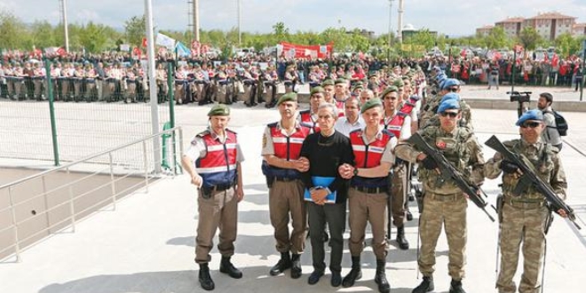 60 bin tutuklu ve hkml tek tip kyafet giyecek