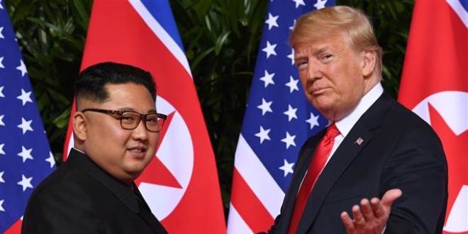 Trump ile Kim tarihi zirvede bulutu