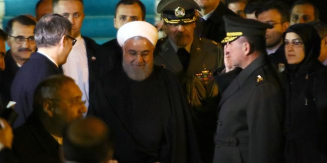 Erdoan, ran Cumhurbakan Ruhani'yi resmi trenle karlad