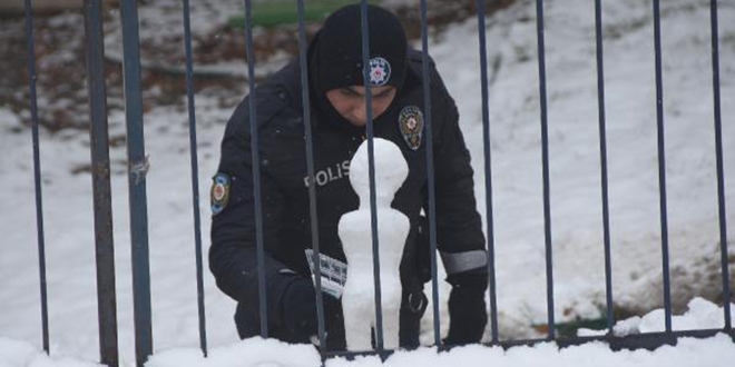 Nbetteki polis kardan adam yapt