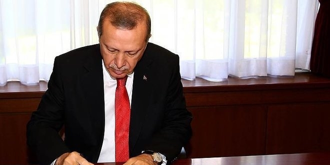 Cumhurbakan Erdoan'dan ehit ailelerine basal mesaj